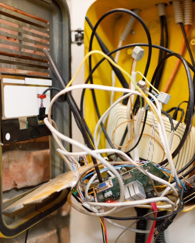 messy-tech-wires-in-a-yellow-box-2026-03-13-01-52-04-utc (Large)
