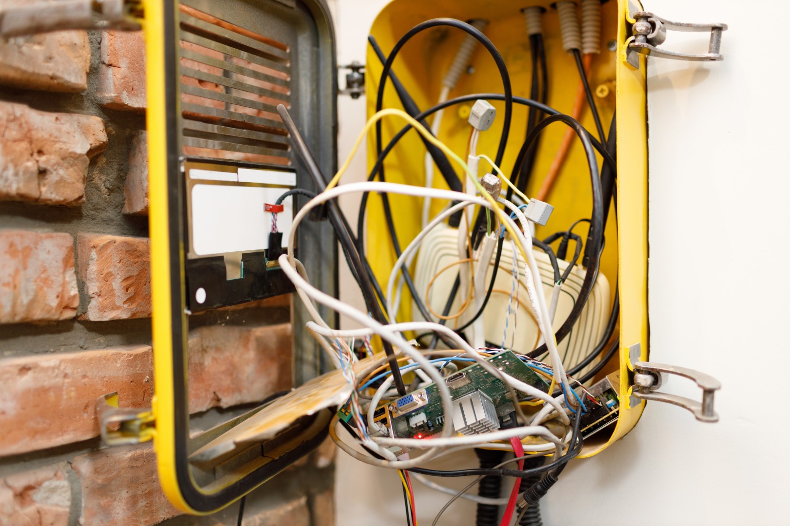 messy-tech-wires-in-a-yellow-box-2026-03-13-01-52-04-utc (Large)